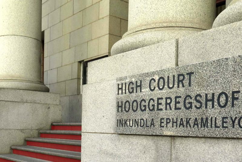 Legal messenger filing documents at the High Court in Cape Town